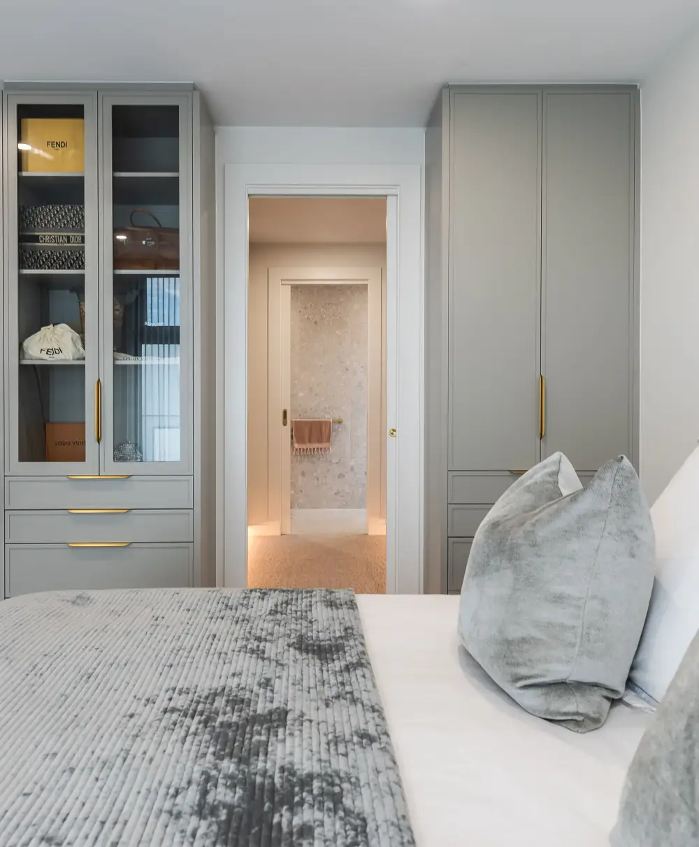 Bedroom with natural light and custom built-ins